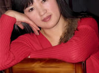 戴眼镜的中年美女图片 风韵犹存中年美女图片