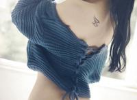 女人纹身私部是男是女：黑社会美女纹身图片