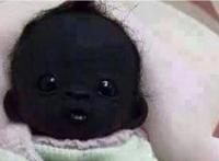 世界上皮肤最黑的人 最黑的小黑孩图片