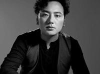 阿果吉曲的故事 海来阿木创作的背景是什么