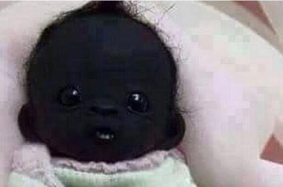 世界上皮肤最黑的人 最黑的小黑孩图片