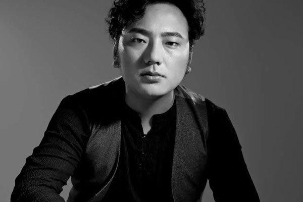 阿果吉曲的故事 海来阿木创作的背景是什么