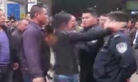 帮丈夫出头打警察，护夫袭警罪难逃