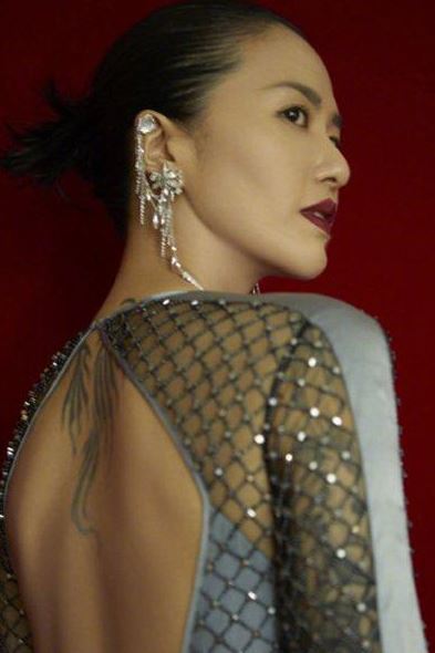 ​谭维维纹身花臂是什么图案?谭维维花臂纹身寓意