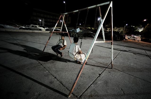 卡扎菲逃了！利比亚美女庆祝战争胜利【组图】